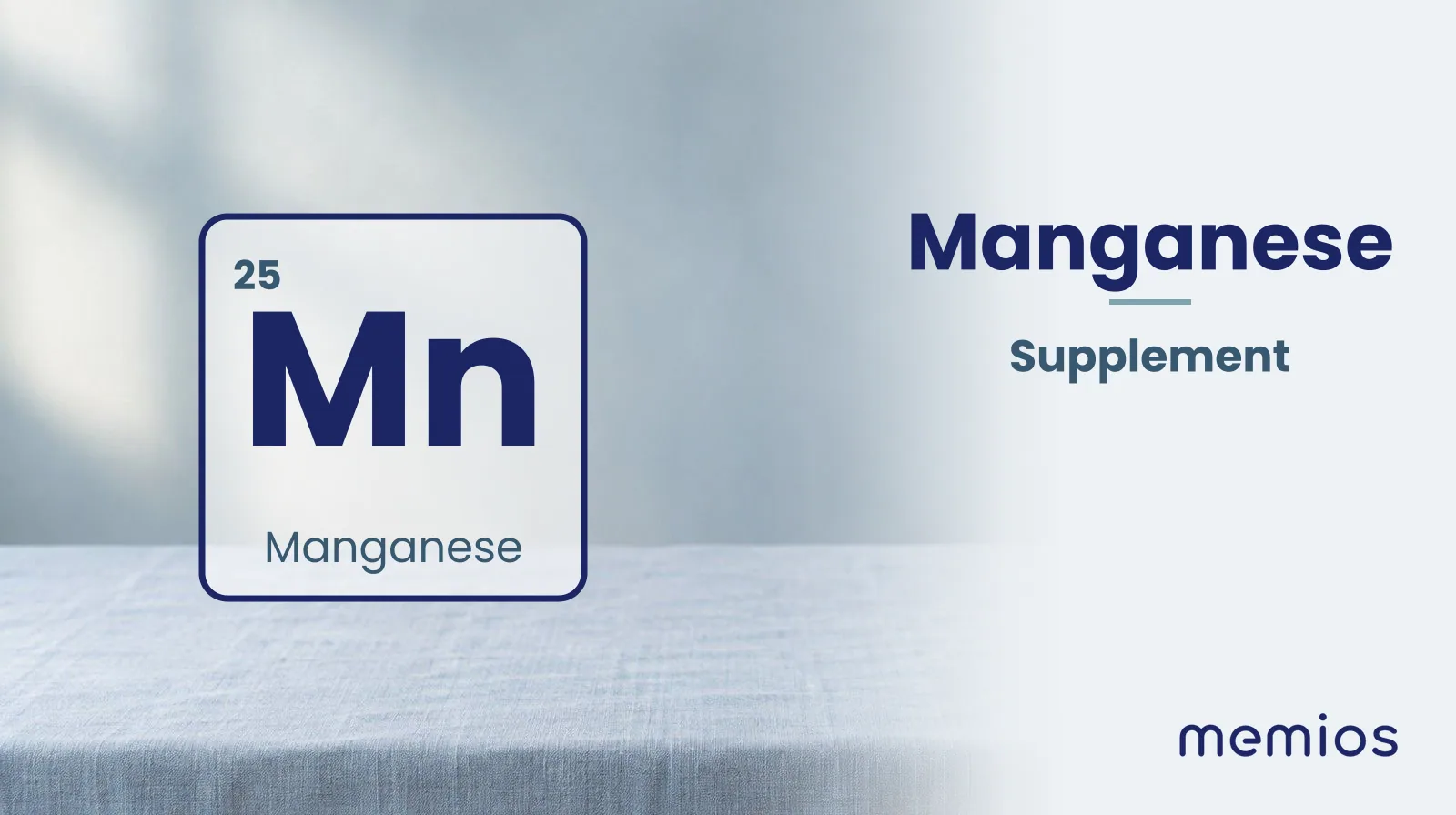 The chemical symbol Mn for Manganese, drawn on pale linen.
